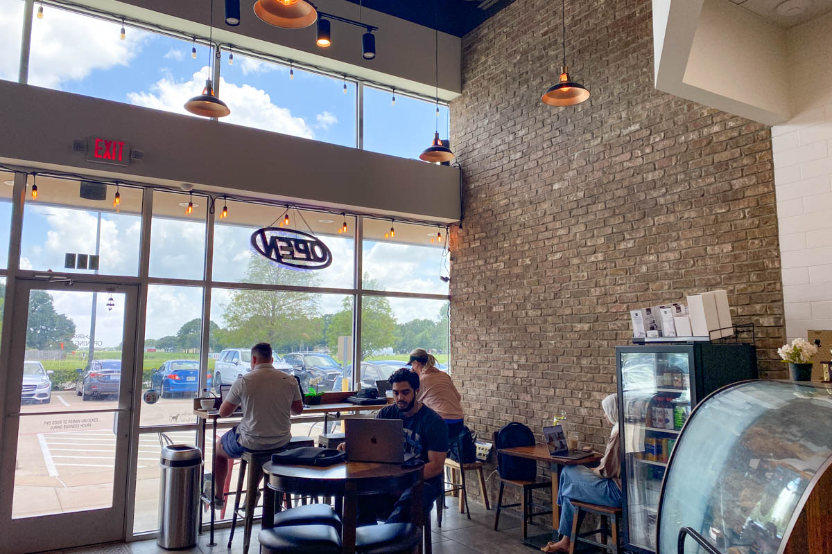 Customers working and enjoying Dulcédo Coffee