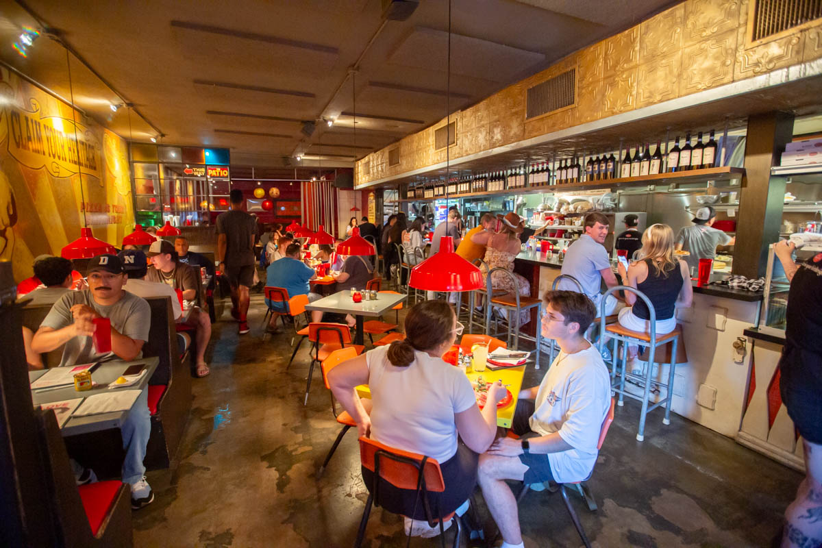 Dining area inside Home Slice Pizza in Austin, TX