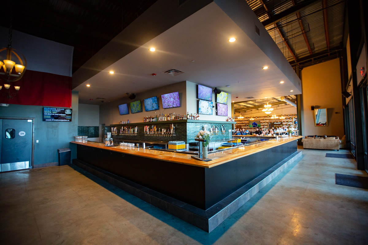 The huge bar wraps around and many beers on tap