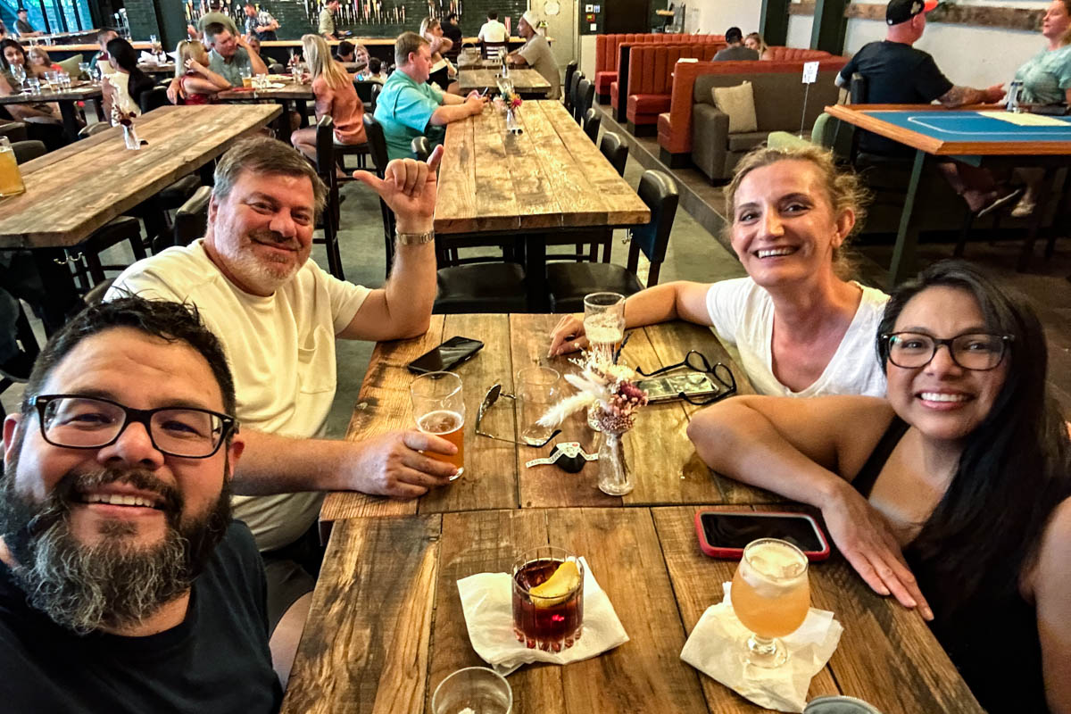 Friends having drinks at Katy Beer Garden