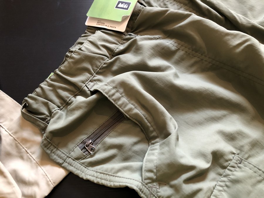 Previous design of the REI Convertible Pants with small zipper on pocket