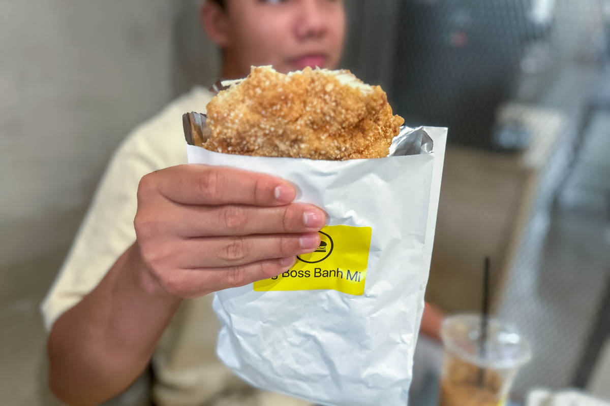 Diego holding the huge Boss Lady Fried Chicken